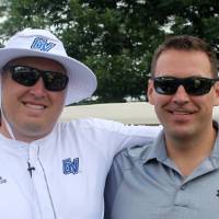 man in white and man in grey pose